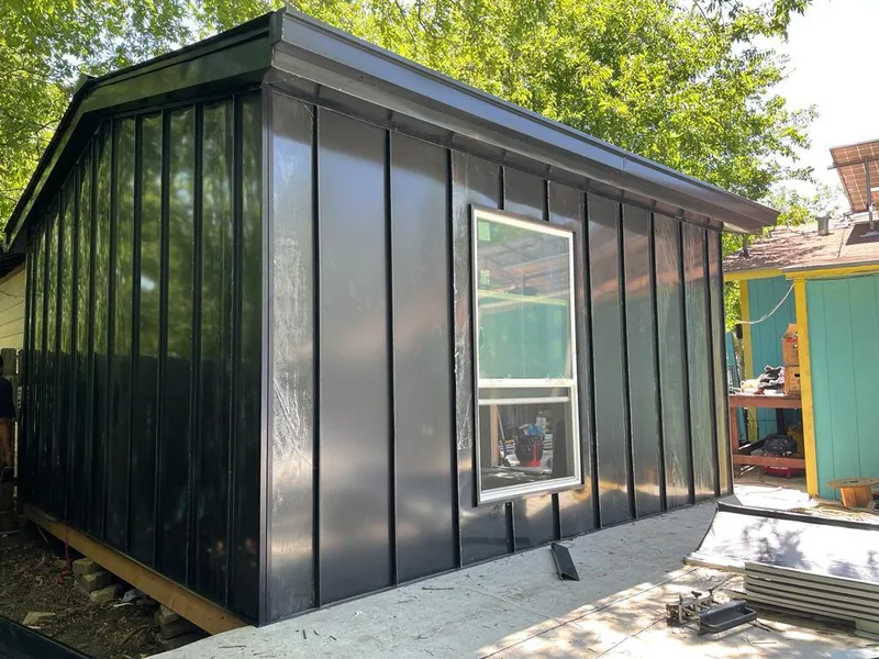 Black standing seam metal wall panels for Roof Inspection in Pomfret