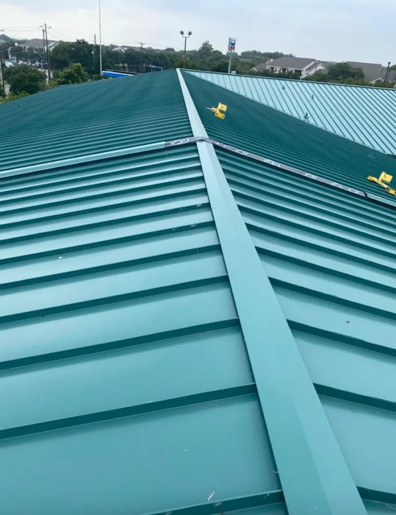 Green commercial metal roof ridge and valley for Metal Roof Repair in Pomfret